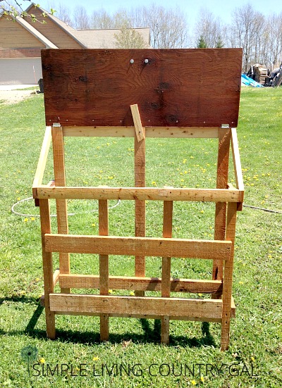 How to build nesting boxes for your chickens using materials you have around your farm for next to nothing!