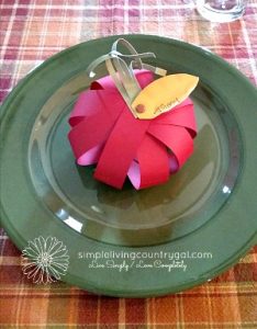 A floral pumpkin place setting. How to save money on thanksgiving dinner