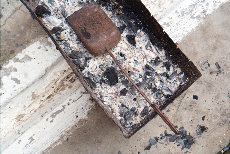 Scoop wood ash into your garden for healthier plants and soil