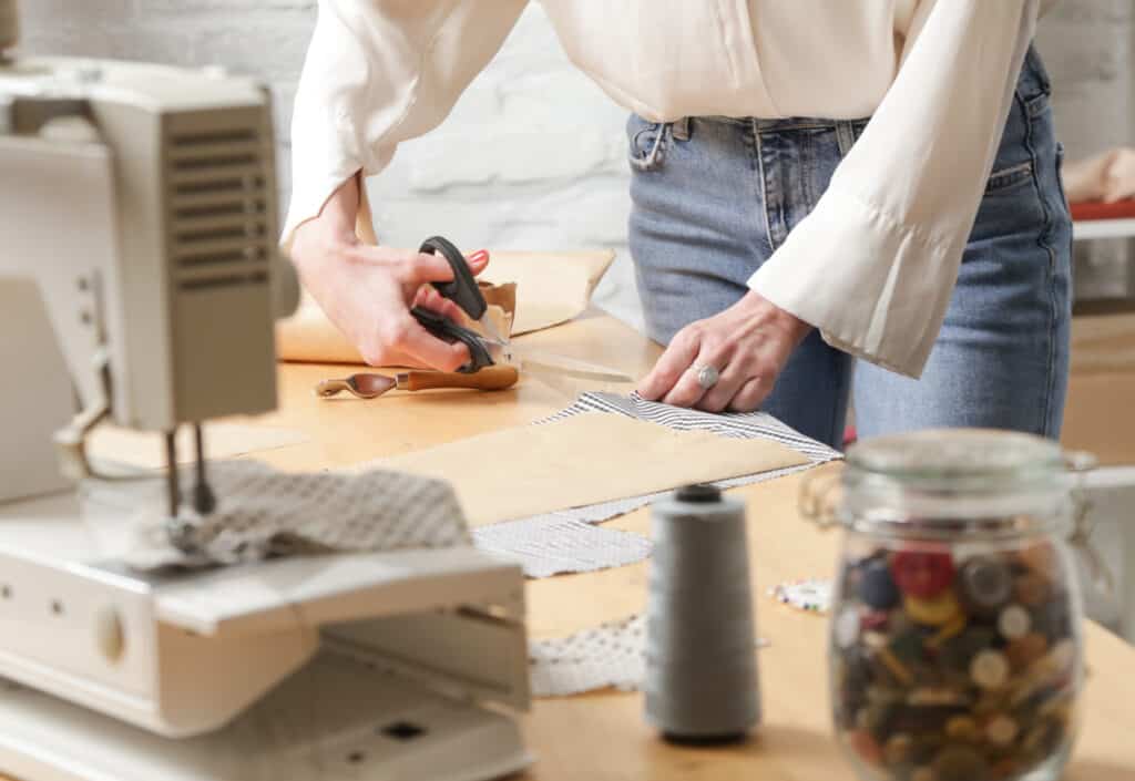 woman cutting fabric