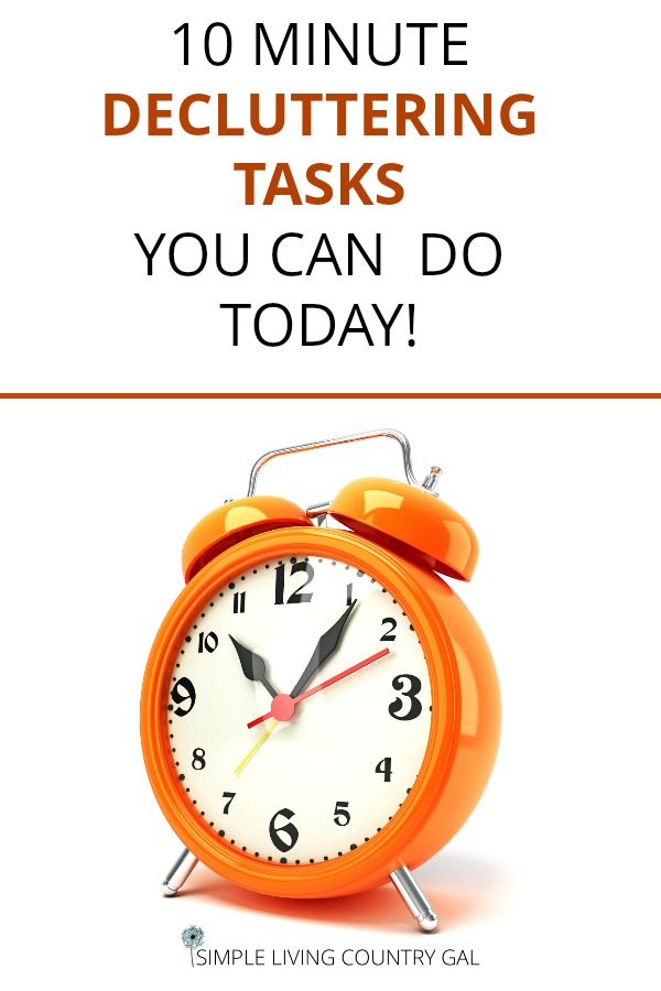 An orange alarm clock and 10 minute decluttering tasks you can do today!