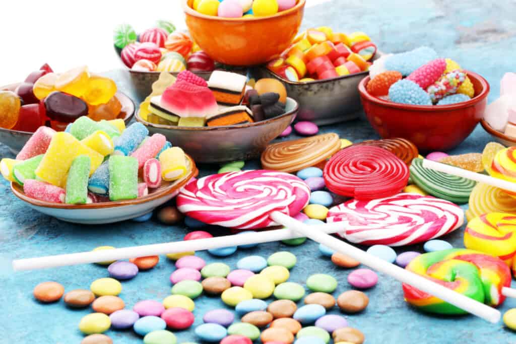 candies with jelly and sugar. colorful array of different childs sweets and treats