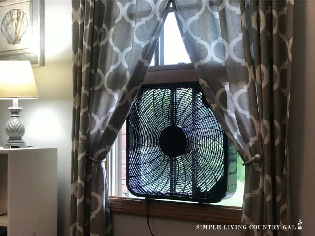 box fan in a window to keep a house cool