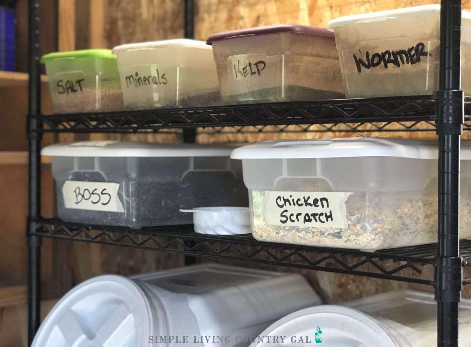 goat minerals stored in storage containers in a feed room