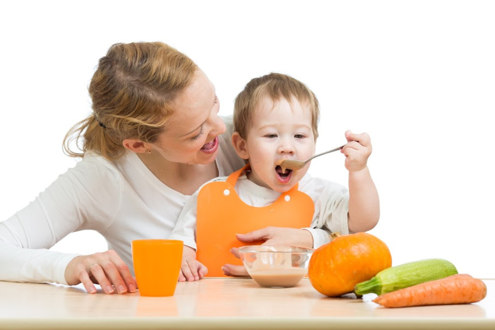 baby eating homemade baby food