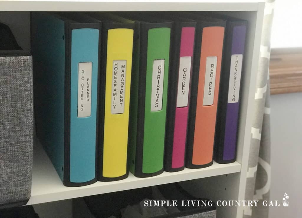 a collection of colored binders for homesteading