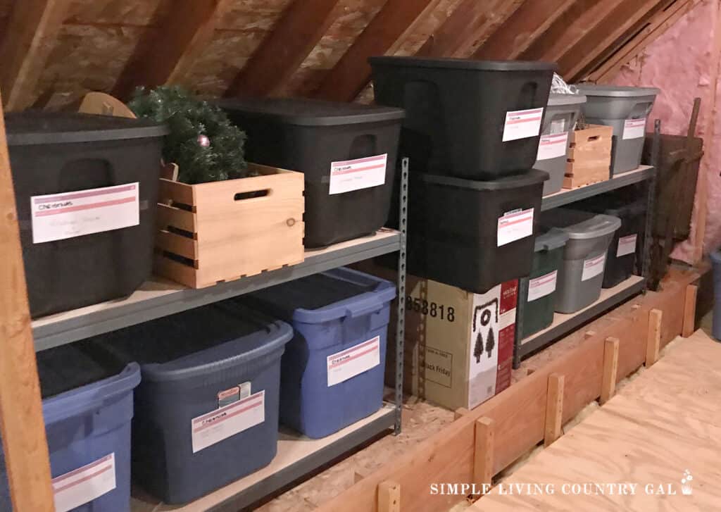 holiday totes organized in an attic