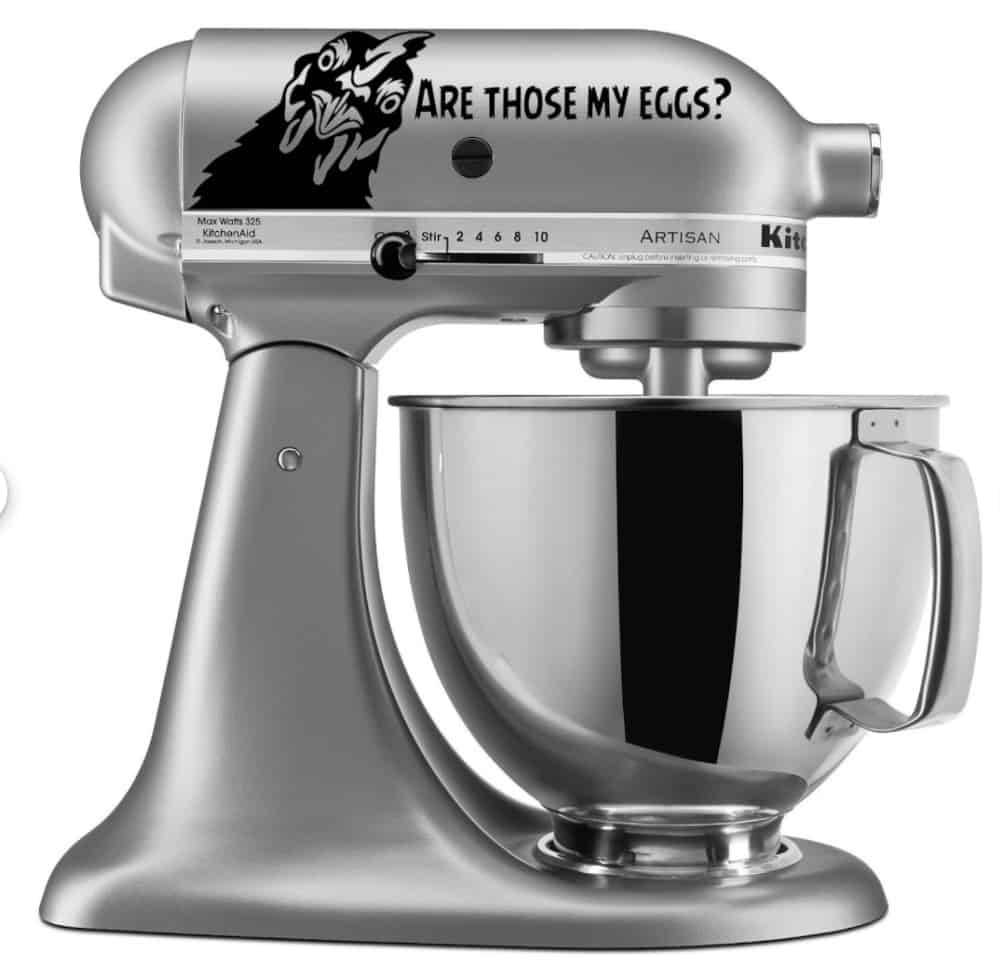 a silver stand mixer with a chicken decal on the front