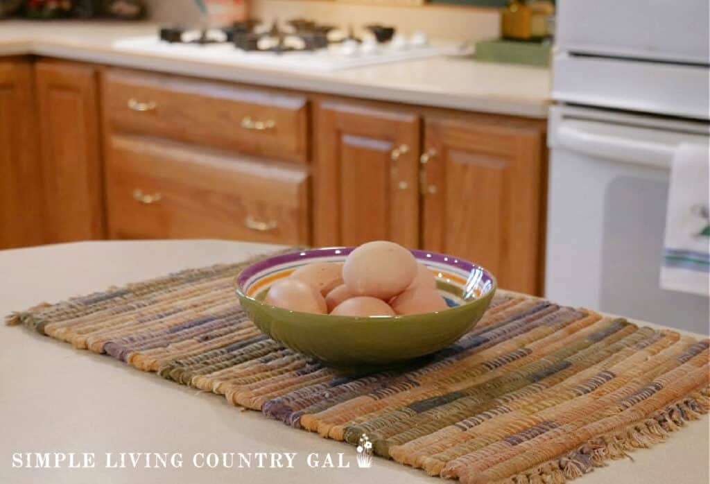 a bowl of eggs on a kitchen counter