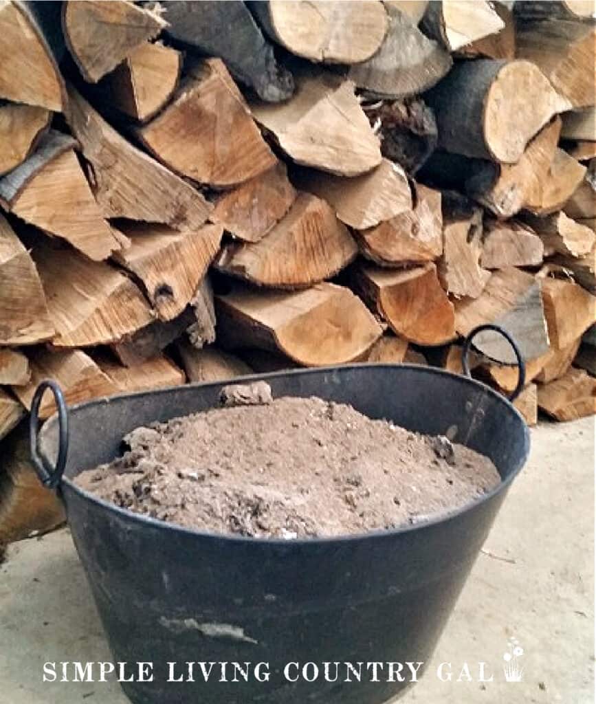 a bucket of ash from a fireplace