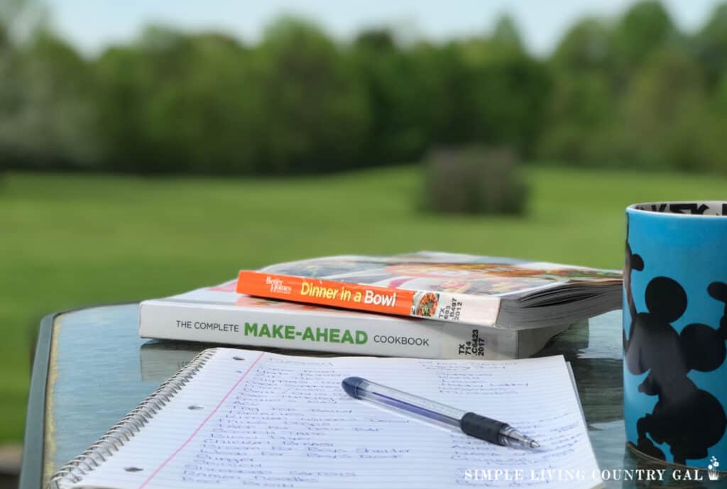 books on a table in a cozy backyard