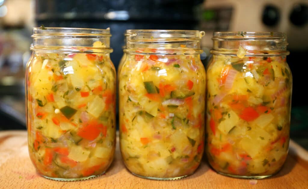 3 jars of veggie salsa on a counter