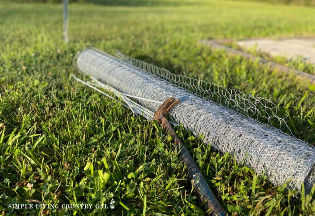 a roll of chicken wire, zip ties and garden stakes