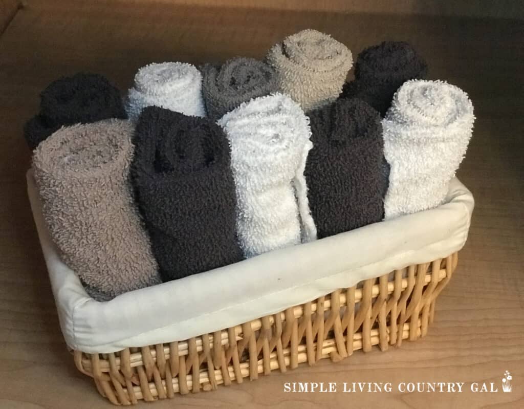 a basket filled with clothes for cleaning