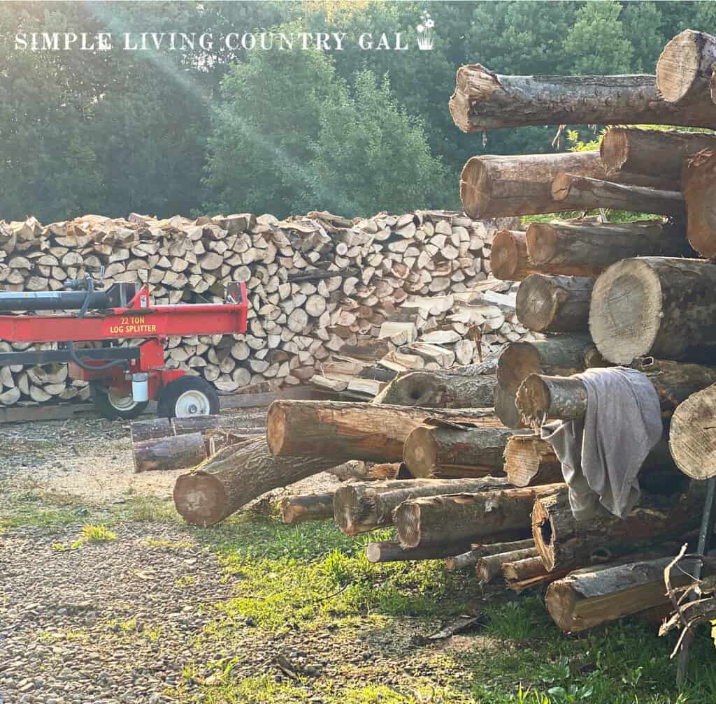 pile of split wood near a wood splitter 
