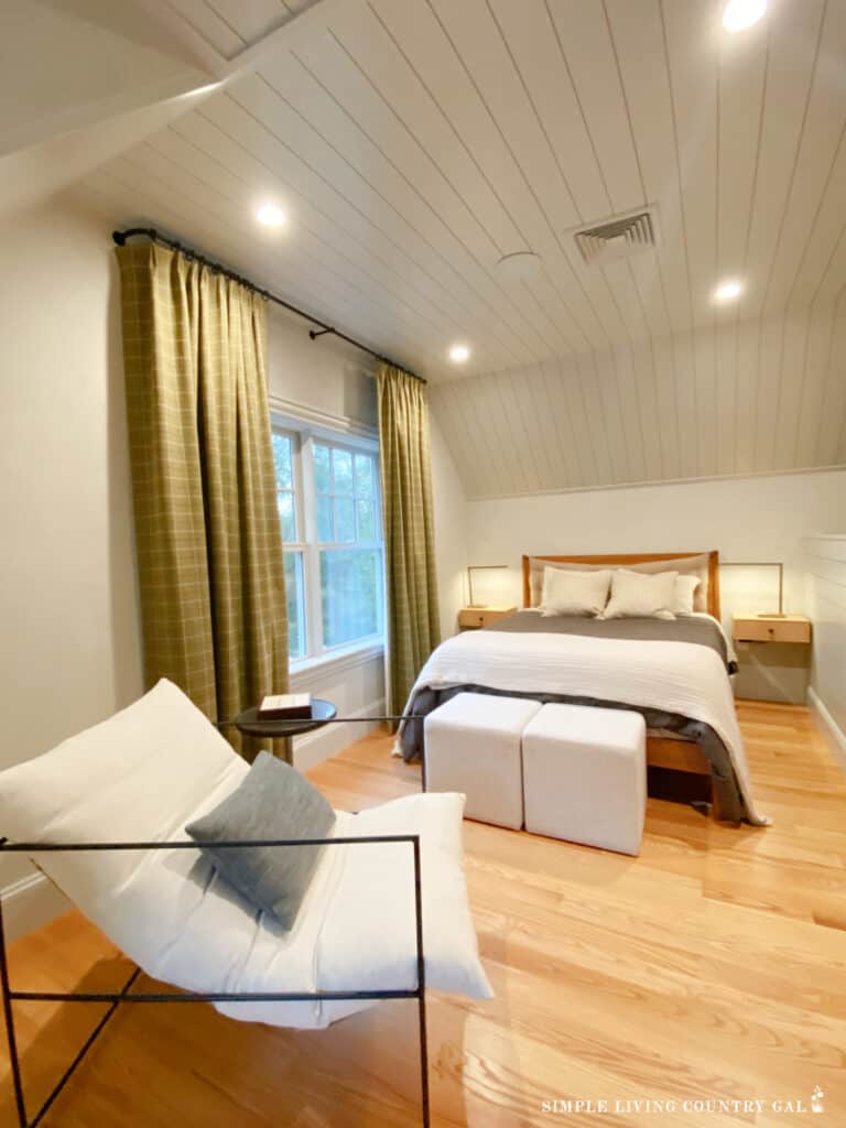 a bedroom with very little furniture