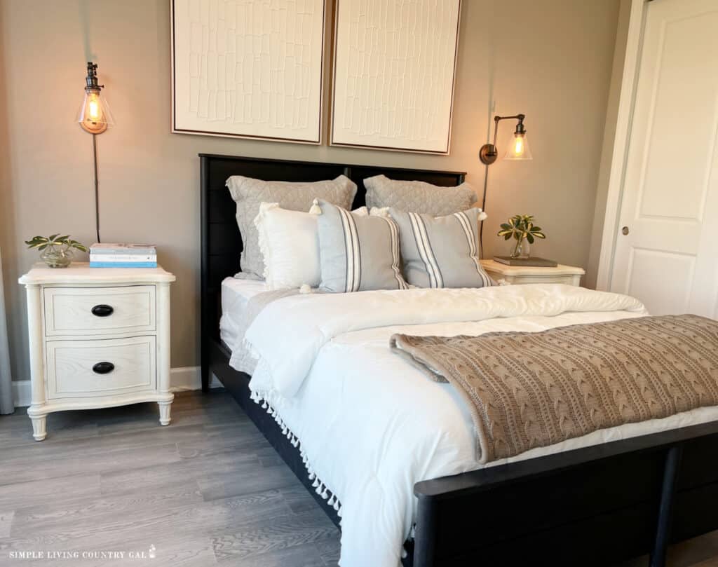 an organized bedside table in a simplified bedroom