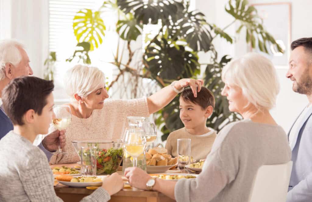 a family eating dinner at a table
